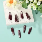 Wine-red embossed silver glitter nails